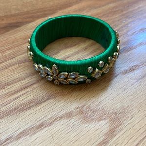 Green bangle with jewels
